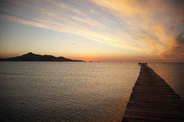 Obraz na płótnie Canvas Pier at sunset