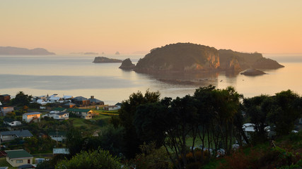 Hahei and a beautiful cliff lighted by the soft light of the sunset, Hahei, Coromandel Peninsula © Javier
