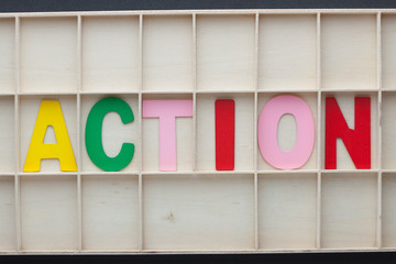 Action Spelled Wooden Letters