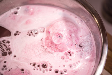 The bright bath bomb dissolves in water .