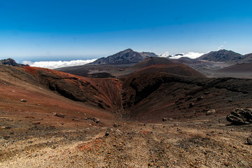 view of a crater,mountains and clouds on the Haleakala National Park