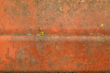 Corroded red metal surface abstract texture