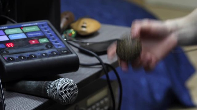Professional Recording Studio. Interface of equipment for sound processing. Fader. Different modes of audio console. Process of working. Neon violet knob light - hand