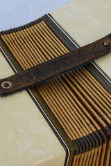 old accordion bellows strap close