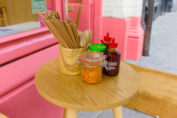 table setup for dinner with eco friendly cutlery and chopsticks