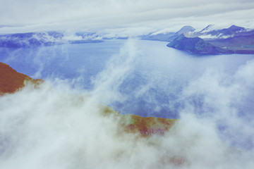 Aerial view of Koltur island in Faroe Islands, North Atlantic Ocean. Photo made by drone from above. Nordic Natural Landscape.