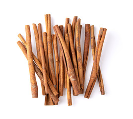 Cinnamon sticks isolated on white background. Top view