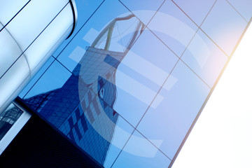 Modern office building with sign Euro on a background of the blu