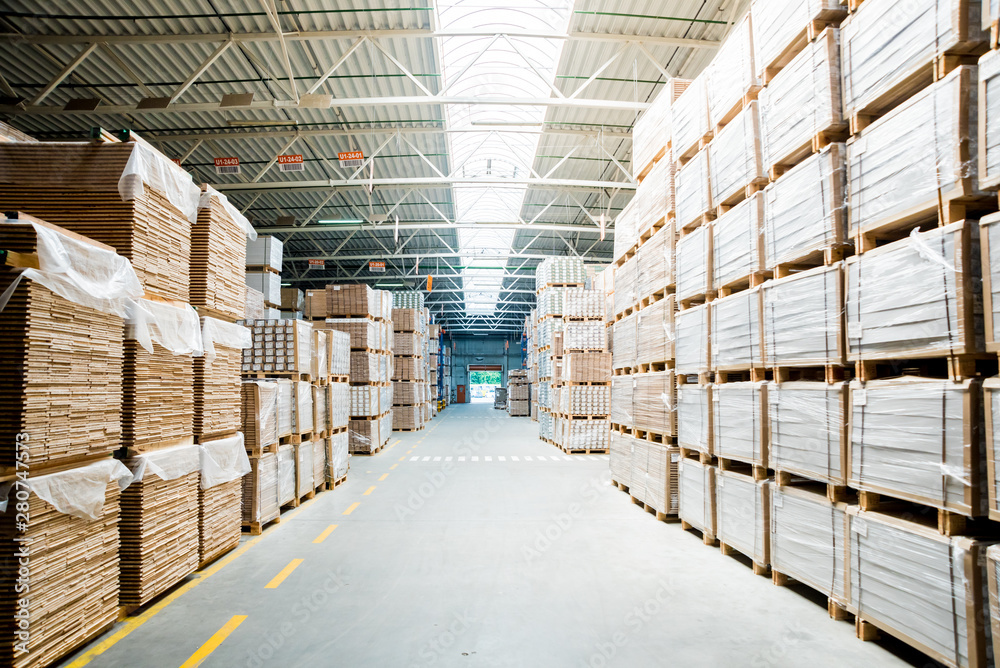 Wall mural Warehouse industrial company. Commercial warehouse. Crates stacked on the shelves.