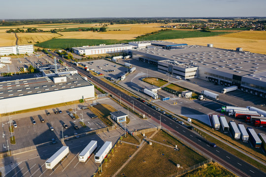 Aerial view of the distribution center, drone photography of the industrial logistic zone.