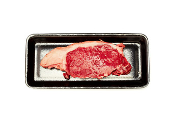 raw beef steak in  package on white