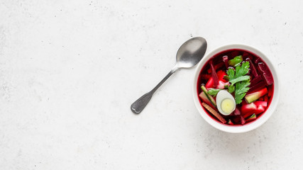 Summer cold beet soup with eggs, cucumber, potatoes and greens