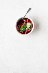 Summer cold beet soup with eggs, cucumber, potatoes and greens