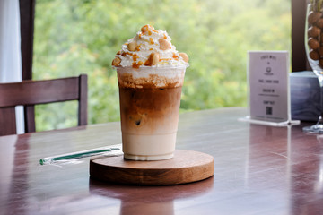 Cold coffee -Iced Caramel Macchiato Layered espresso drink, vanilla syrup, cold creamy milk espresso
