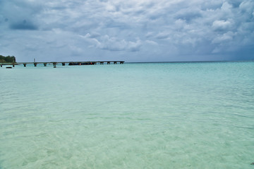 Turquoise water of Caribbean sea On Blue Sky Vacation Day