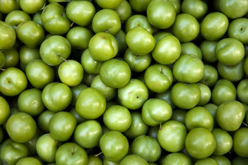 Heap of fresh organic green plums, greengage, at A Street Market In Istanbul, Turkey