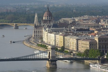 Fototapeta premium Neo-Gothic Parliament building is the largest and most beautiful in Hungary. The residence of Parliament stands on the banks of the Danube in Budapest. The building was built in neo-gothic style.
