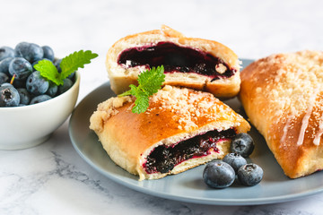 Traditional polish yeast cake with blueberries (jagodzianka).