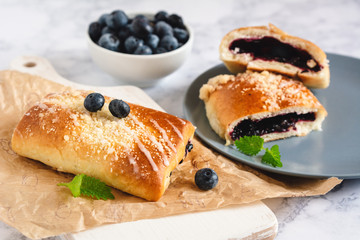 Traditional polish yeast cake with blueberries (jagodzianka).
