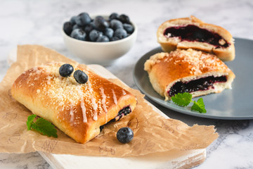 Traditional polish yeast cake with blueberries (jagodzianka).