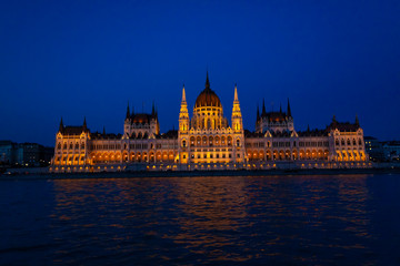 Fototapeta premium Hungarian parliament at night. View from the Danube River.