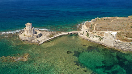 Aerial drone panoramic view of iconic Venetian castle of Methoni and Bourtzi tower on the southwest cape of Messinia, Peloponnese, Greece