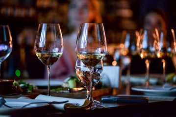 glasses of wine on table in restaurant