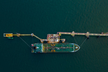 oil and tanker ship on the sea port oil and petrochemical product export business from refinery...