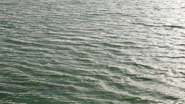 Close up River waves texture. Summer rest. Calm atmosphere. Stress relive 