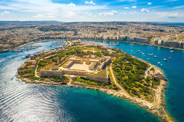 Aerial view of Fort Manoel. Manoel island. Sunny day and blue sky, clouds background. Malta Island - obrazy, fototapety, plakaty