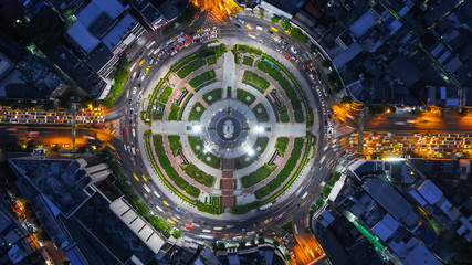 Aerial top view traffic road roundabout in city at night, Time lapse top road in bangkok.
