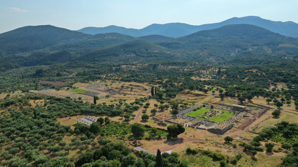 Fototapeta na wymiar Aerial drone photo of unique and well preserved archaeological site and citadel of Ancient Messene featuring massive stadium and theatre, Messinia, Peloponnese, Greece