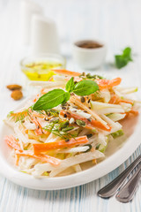Root vegetablesa salad on wooden background. Selective focus, space for text