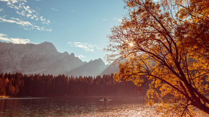 Colorful autumn foliage at the alpine lake