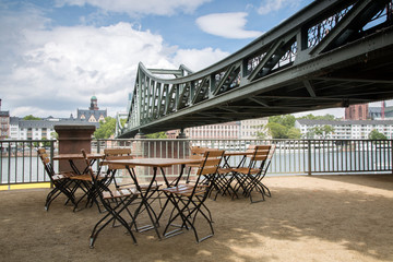 Eiserner Steg Bridge with Cafe Table and Chairs; Frankfurt