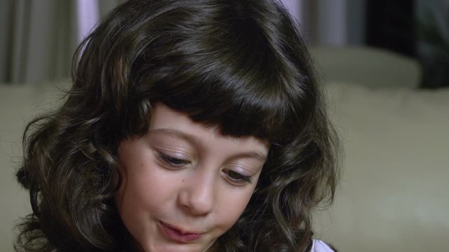 A close up portrait of a millennial female child performing shame, bored and angy expressions FDV