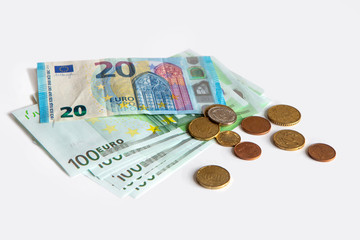Banknotes of 20 and 100 euros on a white isolated background. Saving. The currency of the European Union.