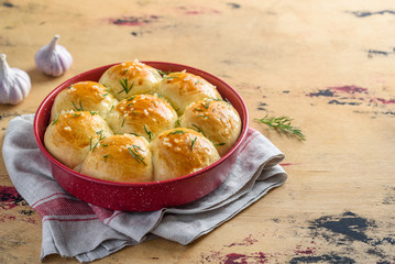 Buns with garlic and dill. Traditional Ukrainian bread to borscht - pampushki. Selective focus