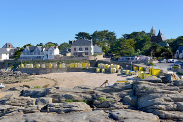 Beach of Saint Michel with its yellow beach huts of Batz-sur-Mer, a commune in the Loire-Atlantique...