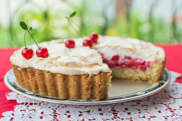 Tart with cherry and meringue