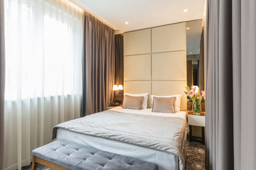 Interior of a luxury hotel double bed bedroom