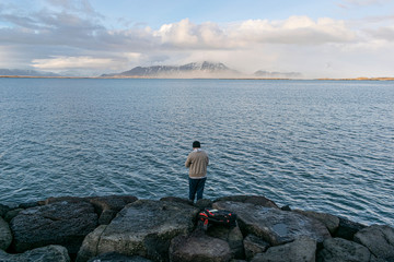 Fototapeta na wymiar The lonely fisherman