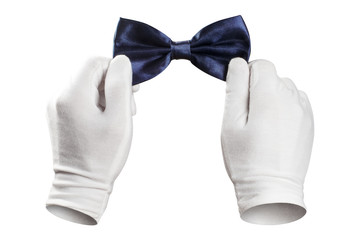 Hands in white gloves adjusting a bowtie, isolated on white background