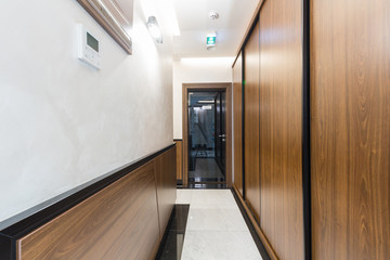 Hotel interior carpeted corridor hallway