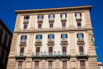 Fototapeta na wymiar Beautiful facades of the antique buildings in Naples old city