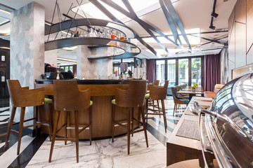 Fototapeta na wymiar Interior of a modern hotel lounge cafe bar restaurant