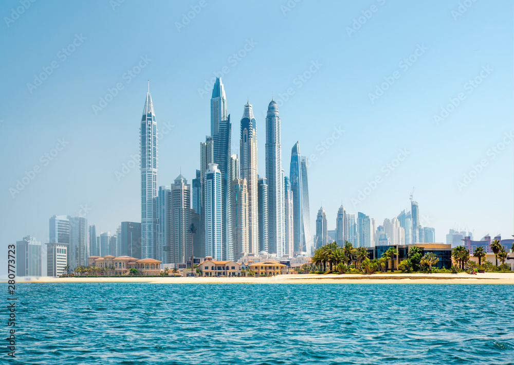 Wall mural dubai, uae united arabs emirates. panoramic view of dubai skyscrapers at the coast. skyscrapers and 