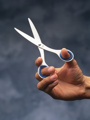 scissors in hand