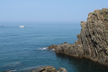 Fototapeta na wymiar Coast rock by Riomaggiore, Cinque Terre
