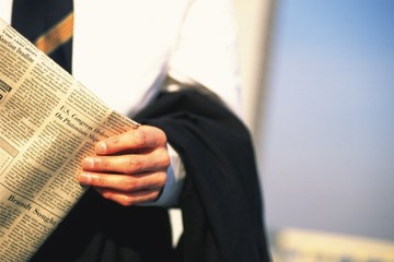 businessman with paper in hands